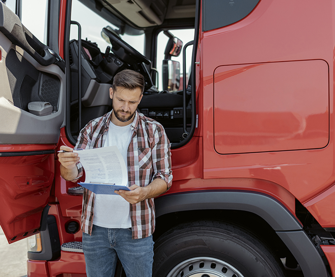 Truck Driver Checking Shipment List